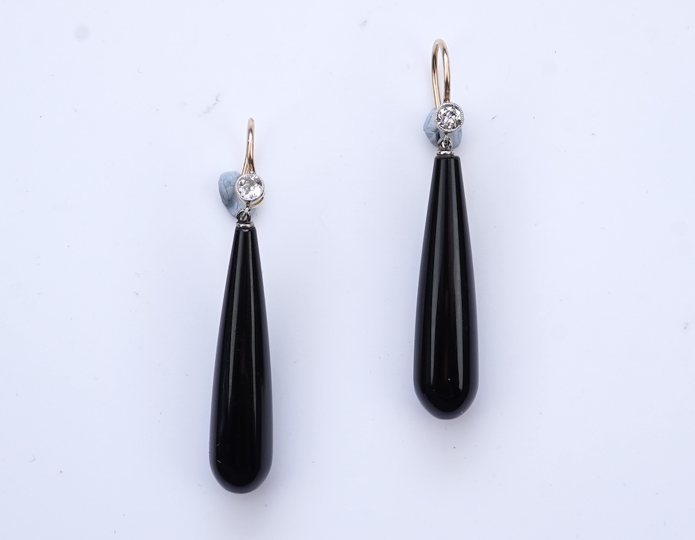 A pair of Art Deco onyx and diamond earrings, early 20th century
